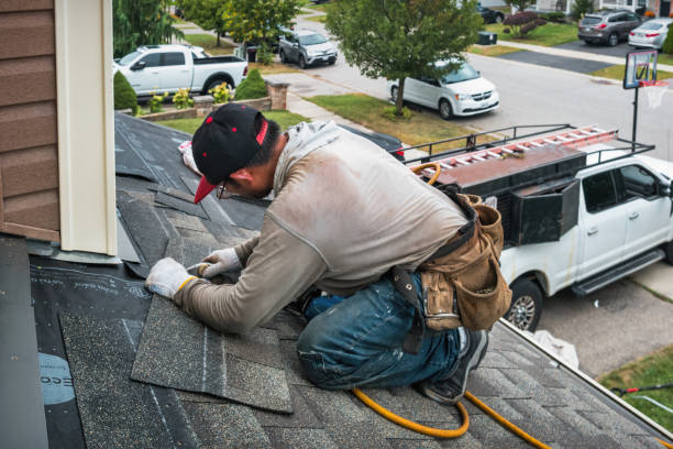 Professional Hail Damage Roof Repair technician working in Woods Cross Roads, VA
